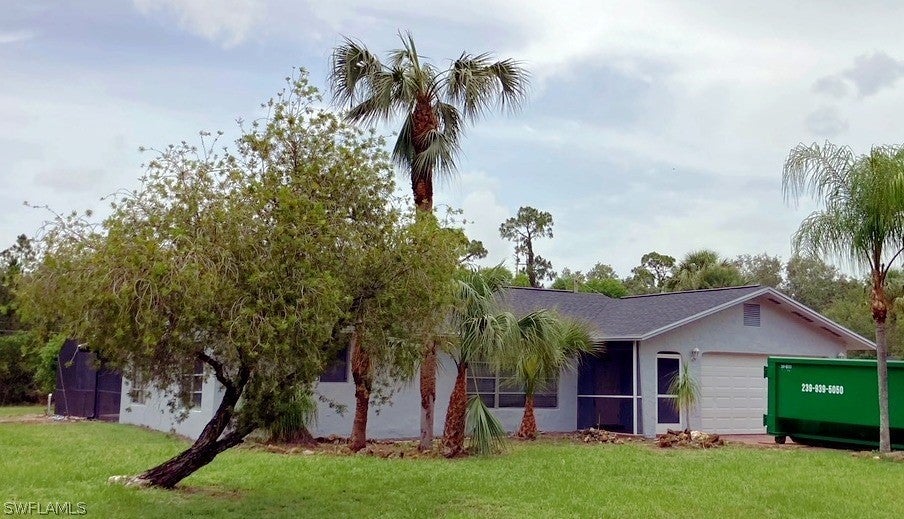 SW Florida Home for Sale - View SW FL MLS Listing #222048779 at 709 5th Ave in LEHIGH ACRES, FL - 33972