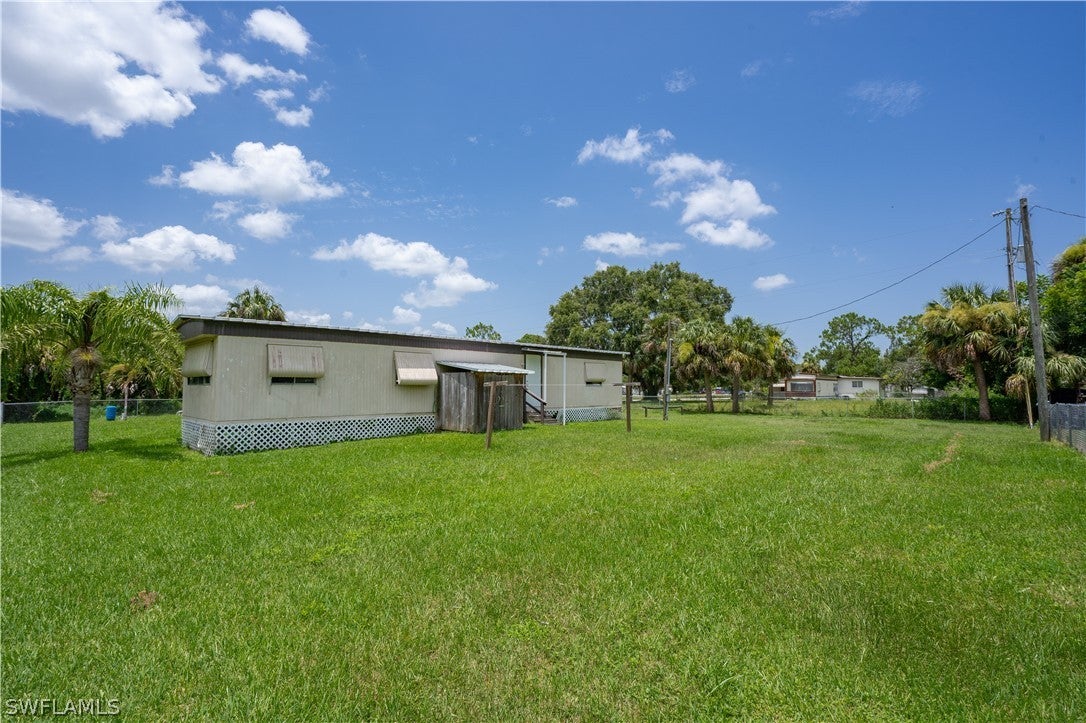 SW Florida Home for Sale - View SW FL MLS Listing #222057491 at 8311 Wooley Dr W in NORTH FORT MYERS, FL - 33917