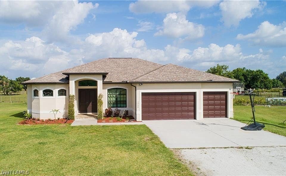 SW Florida Home for Sale - View SW FL MLS Listing #222069650 at 12100 E Homestead Ln in FORT MYERS, FL - 33905