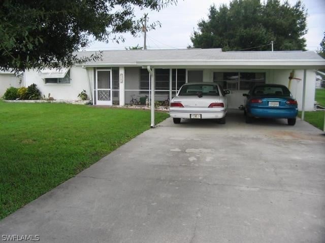 SW Florida Real Estate - View SW FL MLS #222073643 at 1243 Wendell Ave in BELLE AIRE LAGOON in NORTH FORT MYERS, FL - 33903