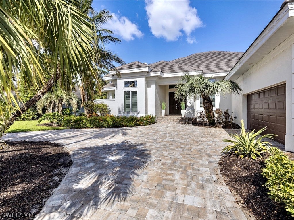 FORT MYERS Real Estate - View SW FL MLS #222082827 at 11410 Compass Point Dr in EDGEWATER at GULF HARBOUR YACHT AND COUNTRY CLUB 