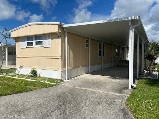 SW Florida Real Estate - View SW FL MLS #222083750 at 21 Arapaho Trl 229 in HITCHING POST MOBILE HOME PARK in NAPLES, FL - 34113